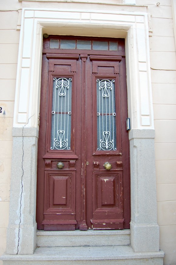 plaka-worn-brown-door